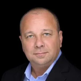 John Sekosan, Agent in  - Compass