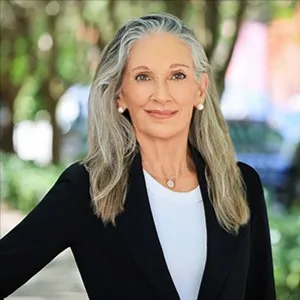 Leslie Cooper, Agent in  - Compass
