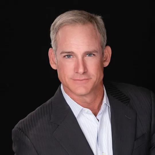 Russell Brown, Agent in  - Compass