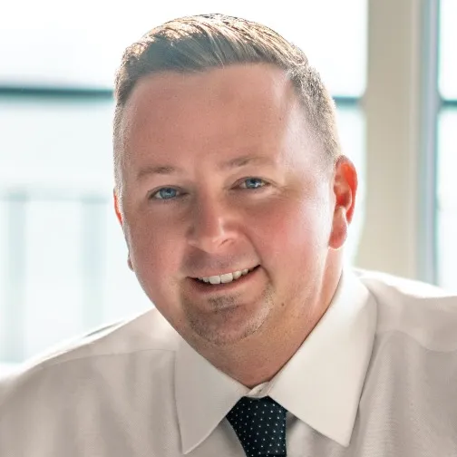 Chris Thompson, Agent in  - Compass