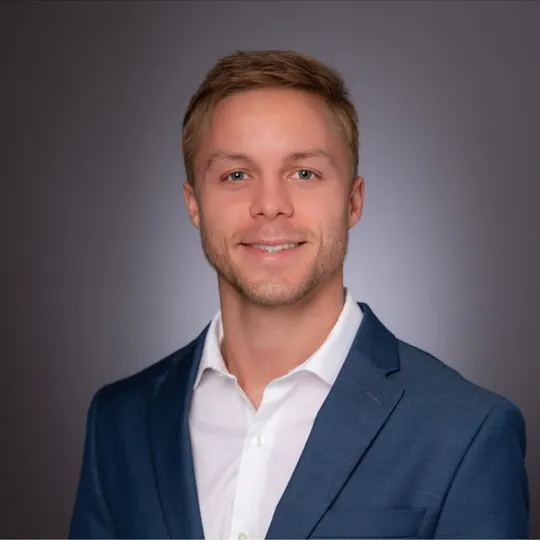 Justin Ratzlaff, Agent in  - Compass