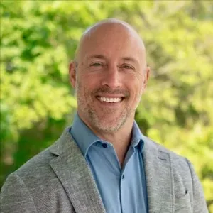 Eric Clark, Agent in  - Compass