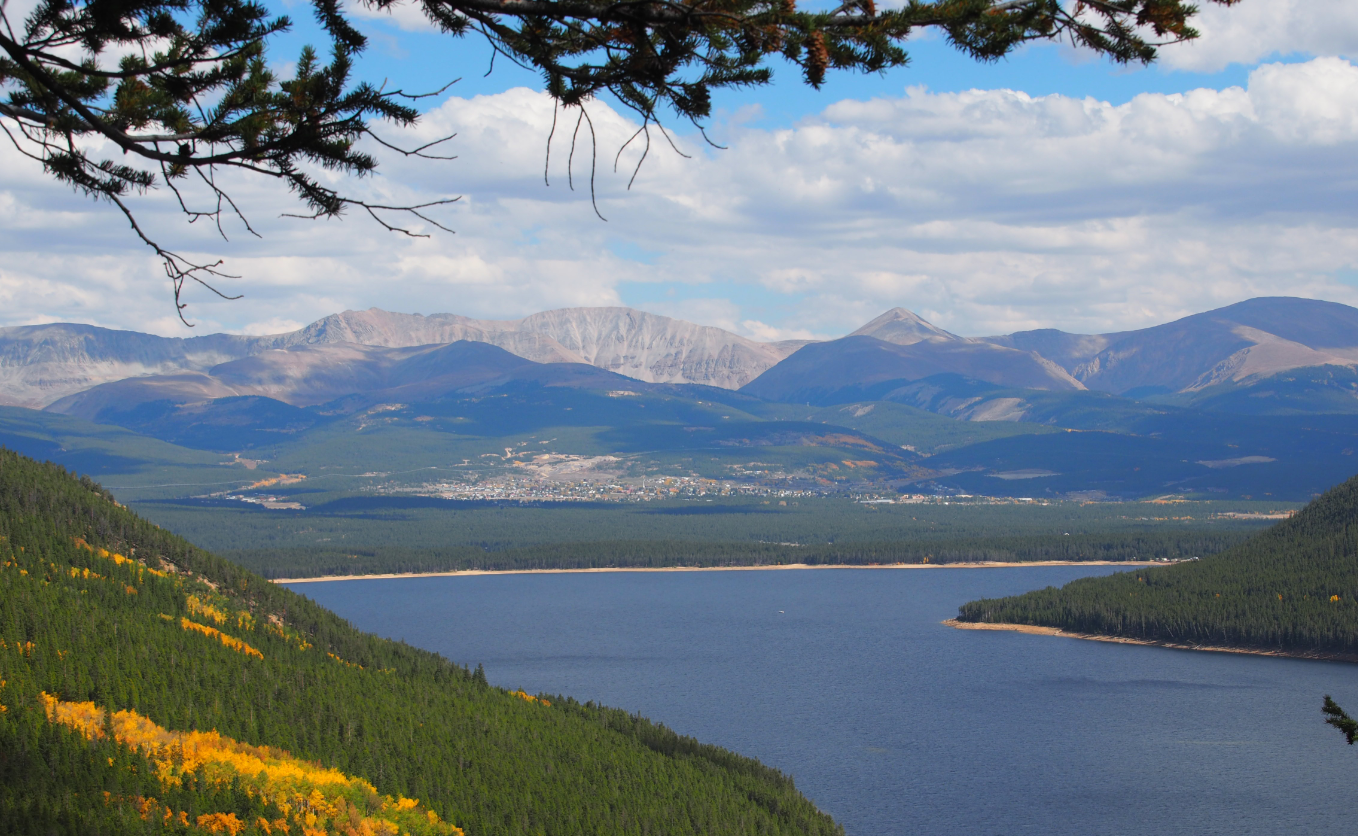 A mountain range with a lake and mountains