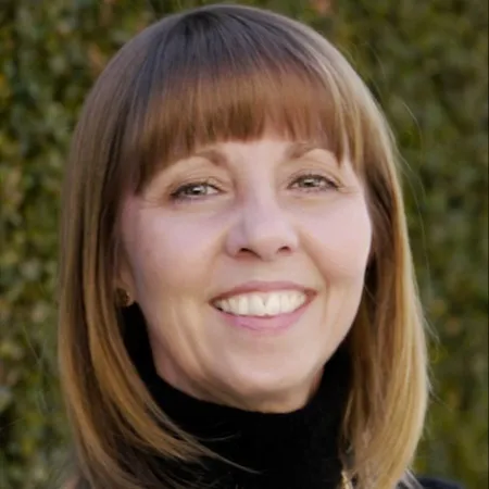 Lynwen Hughes-Boatman, Agent in  - Compass