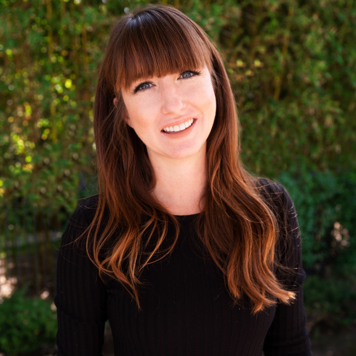 Headshot of Ashley Nuschy