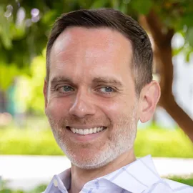 Dan Faulkner, Agent in  - Compass