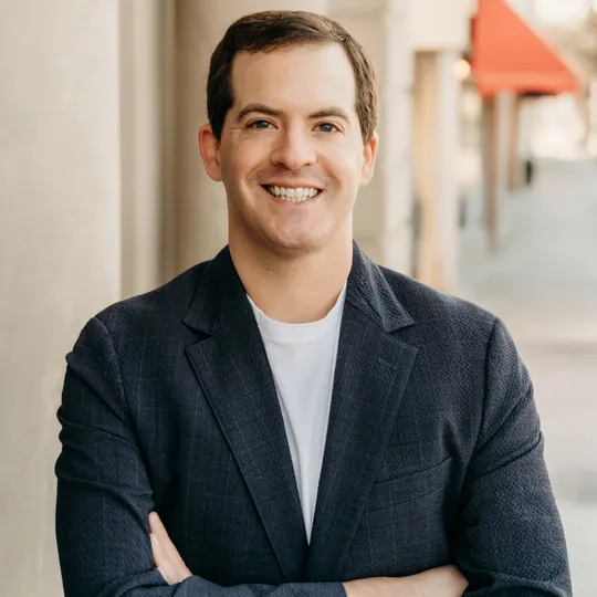 Sam Kahn, Agent in  - Compass