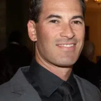 Spencer Gordon, Agent in  - Compass