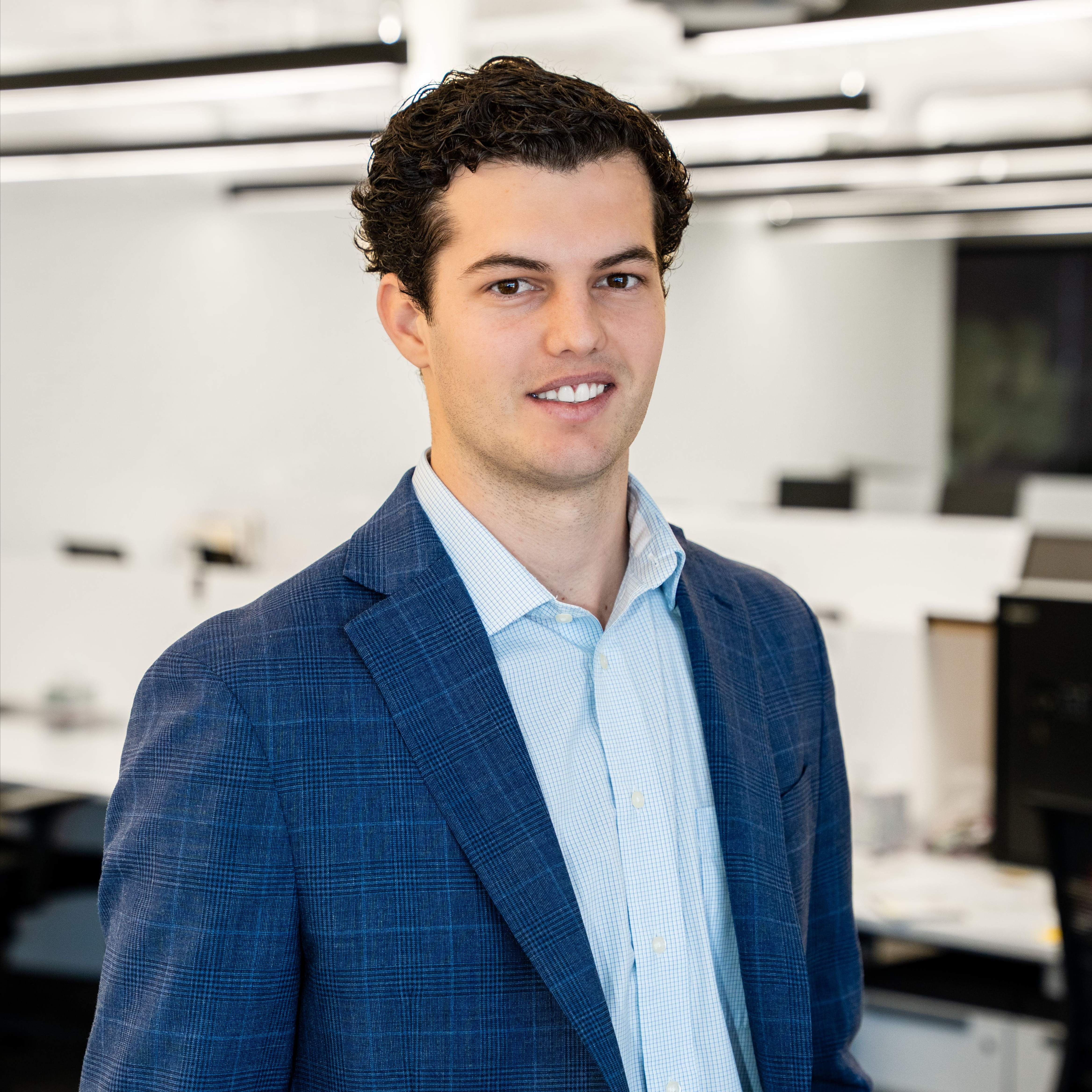 Headshot of Cameron Sine