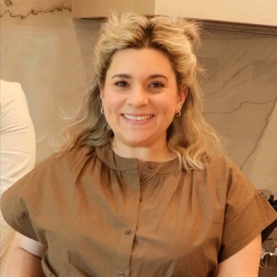 Nikki Caruso, Agent in  - Compass