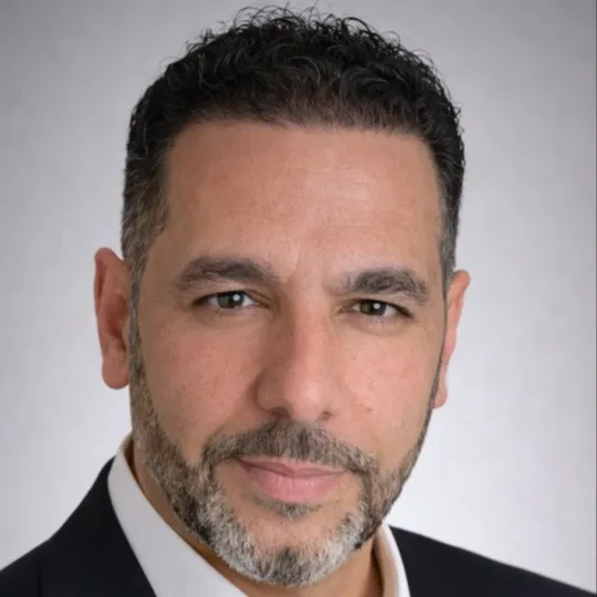 Essen Yousaf, Agent in  - Compass