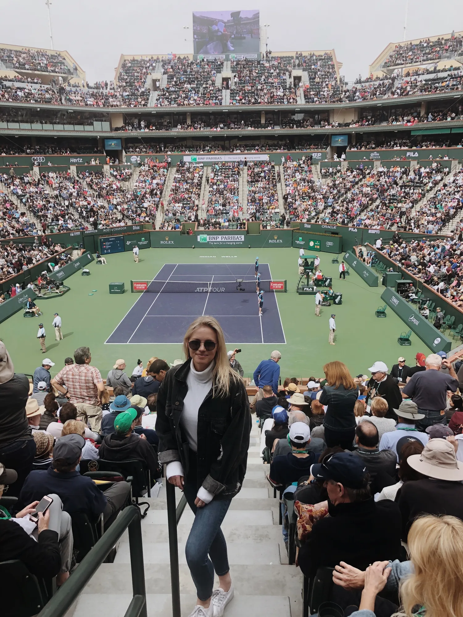 Emma at a tennis match