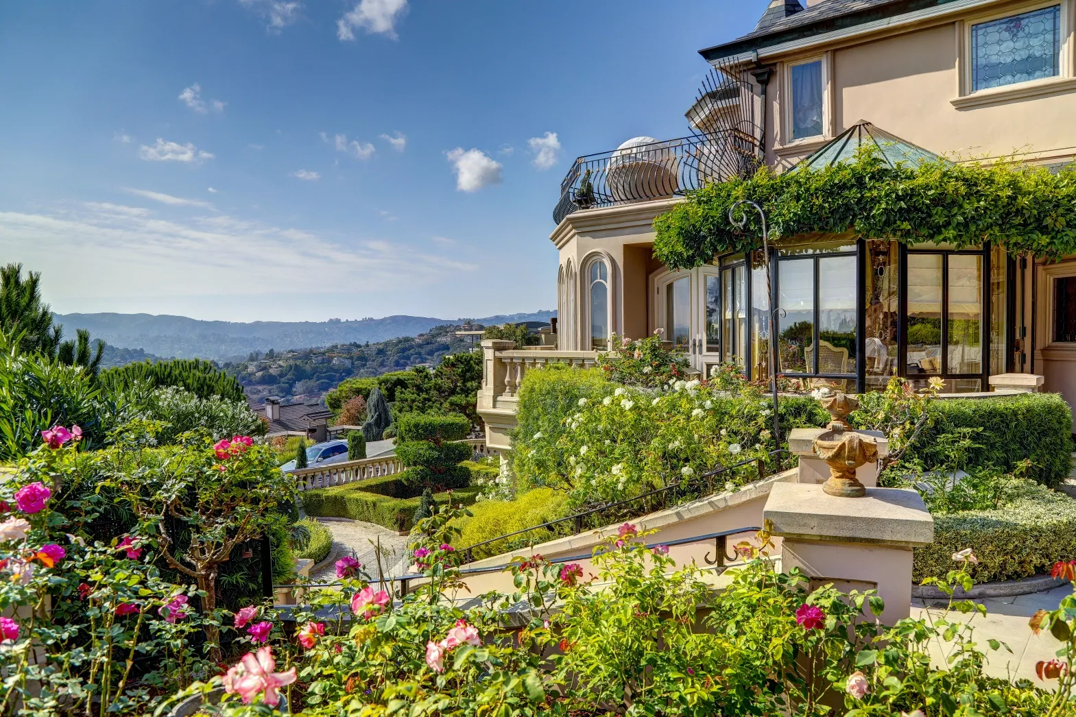 A house with a garden and a balcony.