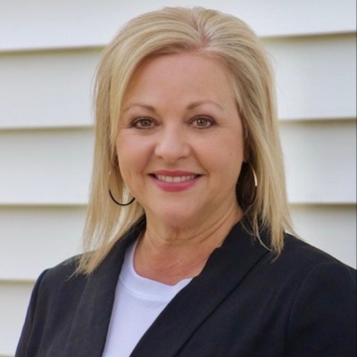 Laurie Belmer, Agent in  - Compass