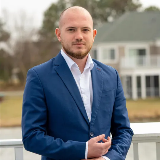 Denis Gusho, Agent in  - Compass