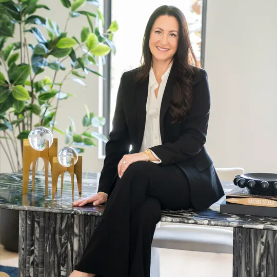 Megann Lucaj, Agent in  - Compass