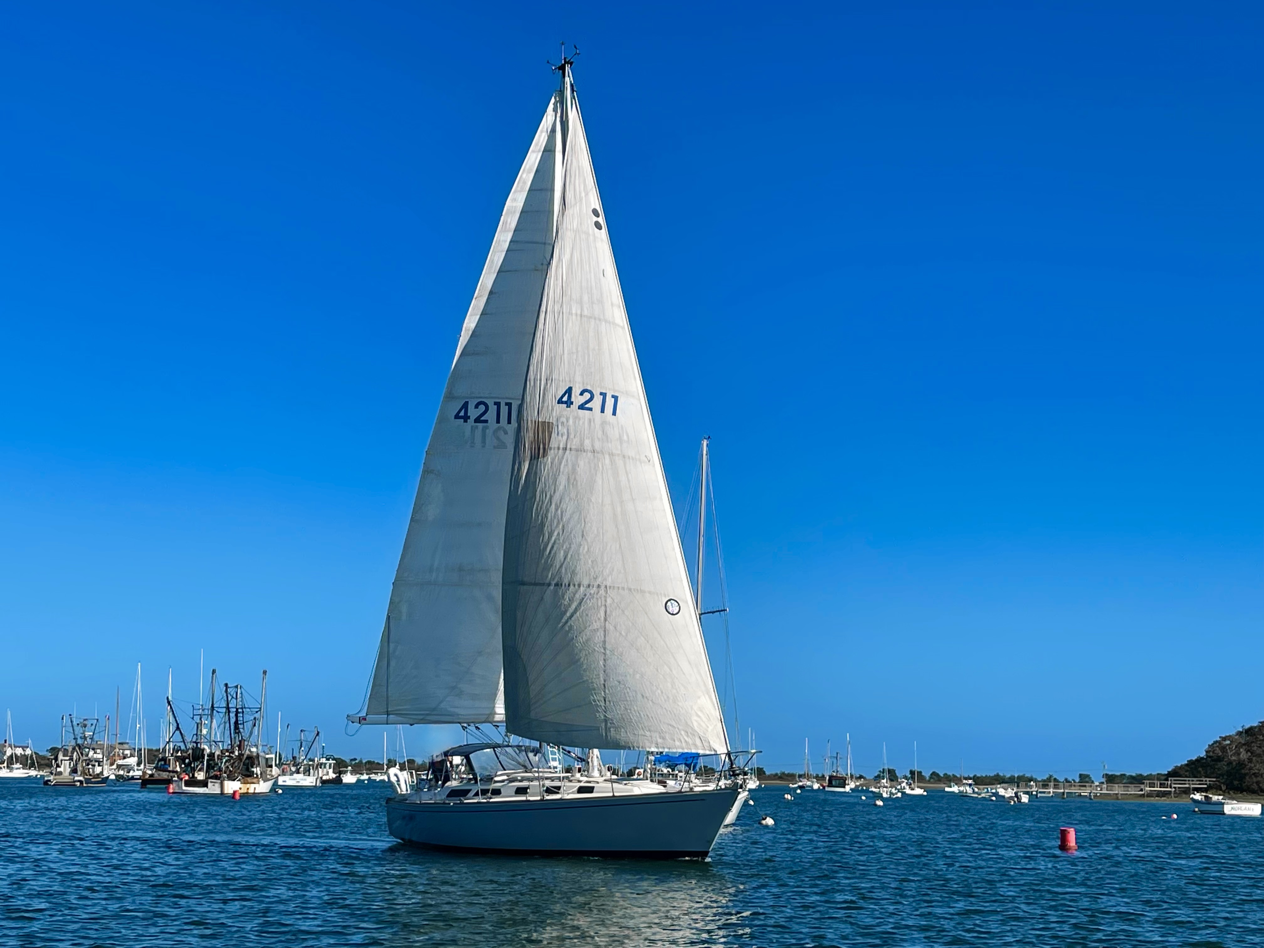 A sailboat sailing in the water