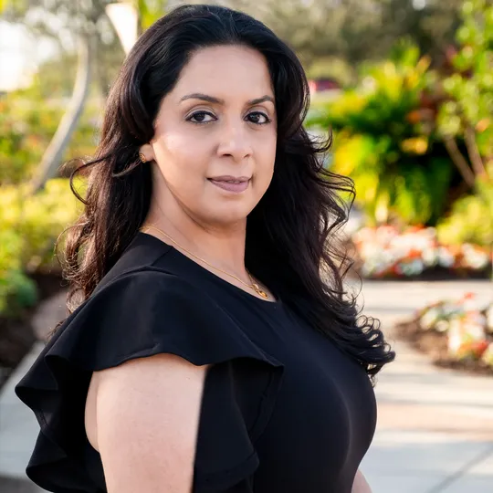 Zubeda Mukati, Agent in  - Compass