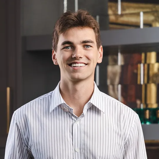 Carson Woosley, Agent in  - Compass