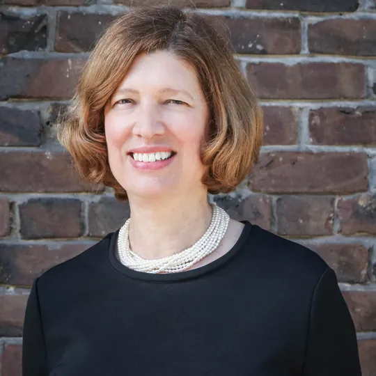 Carol Solfanelli, Agent in  - Compass