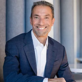 Eddie Azzopardi, Agent in  - Compass
