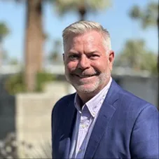 Kevin Koerner, Agent in  - Compass