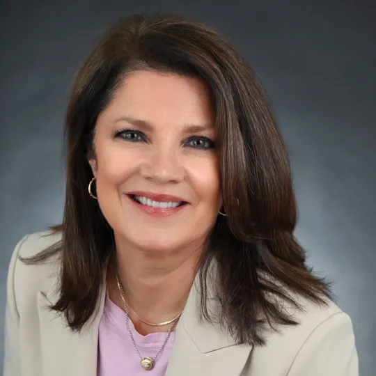 Romy Morgan, Agent in  - Compass