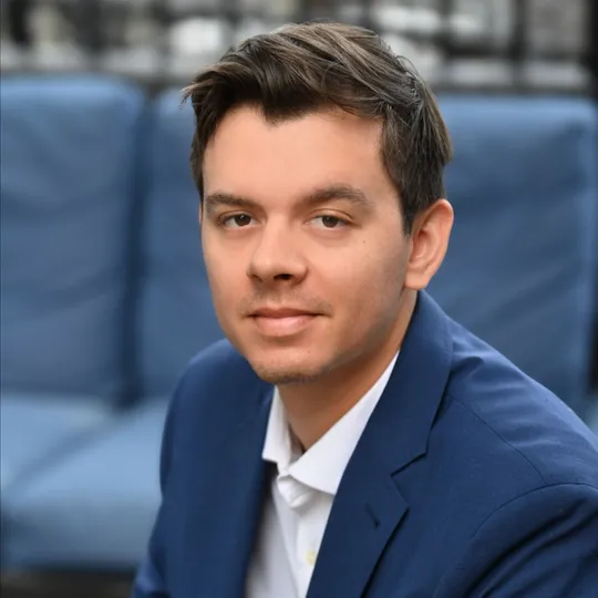 Logan Verrino, Agent in  - Compass