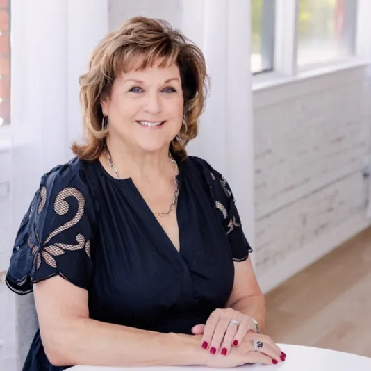 Betsy Weber Hurst, Agent in  - Compass