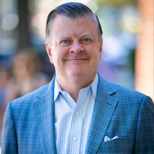 Michael McCooey, Agent in  - Compass