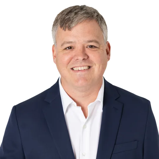John Hanigan, Agent in  - Compass