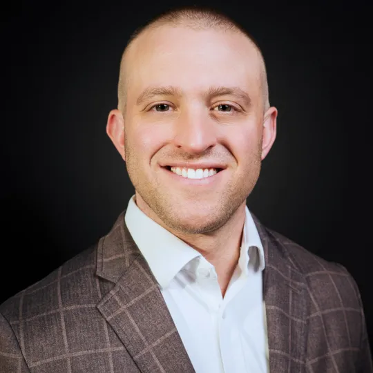 Justin Freedman, Agent in  - Compass