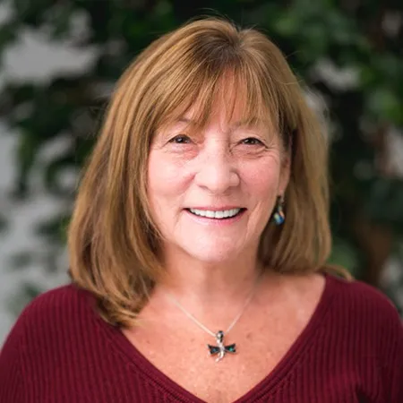 Patti Hostage, Agent in  - Compass