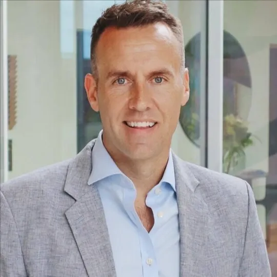 Tim Malone, Agent in  - Compass