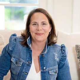 Maggie Garza, Agent in  - Compass