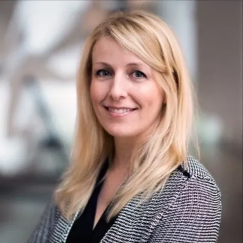 Kira Lyons, Agent in  - Compass