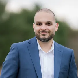Adam Abdallah, Agent in  - Compass