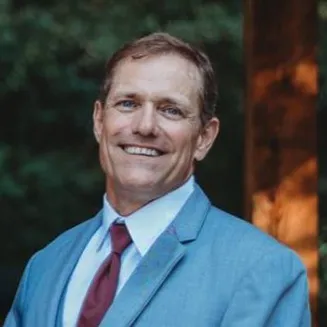 Karl Cavaretta, Agent in  - Compass