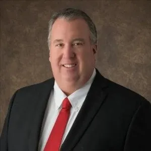 Chris Moore, Agent in  - Compass