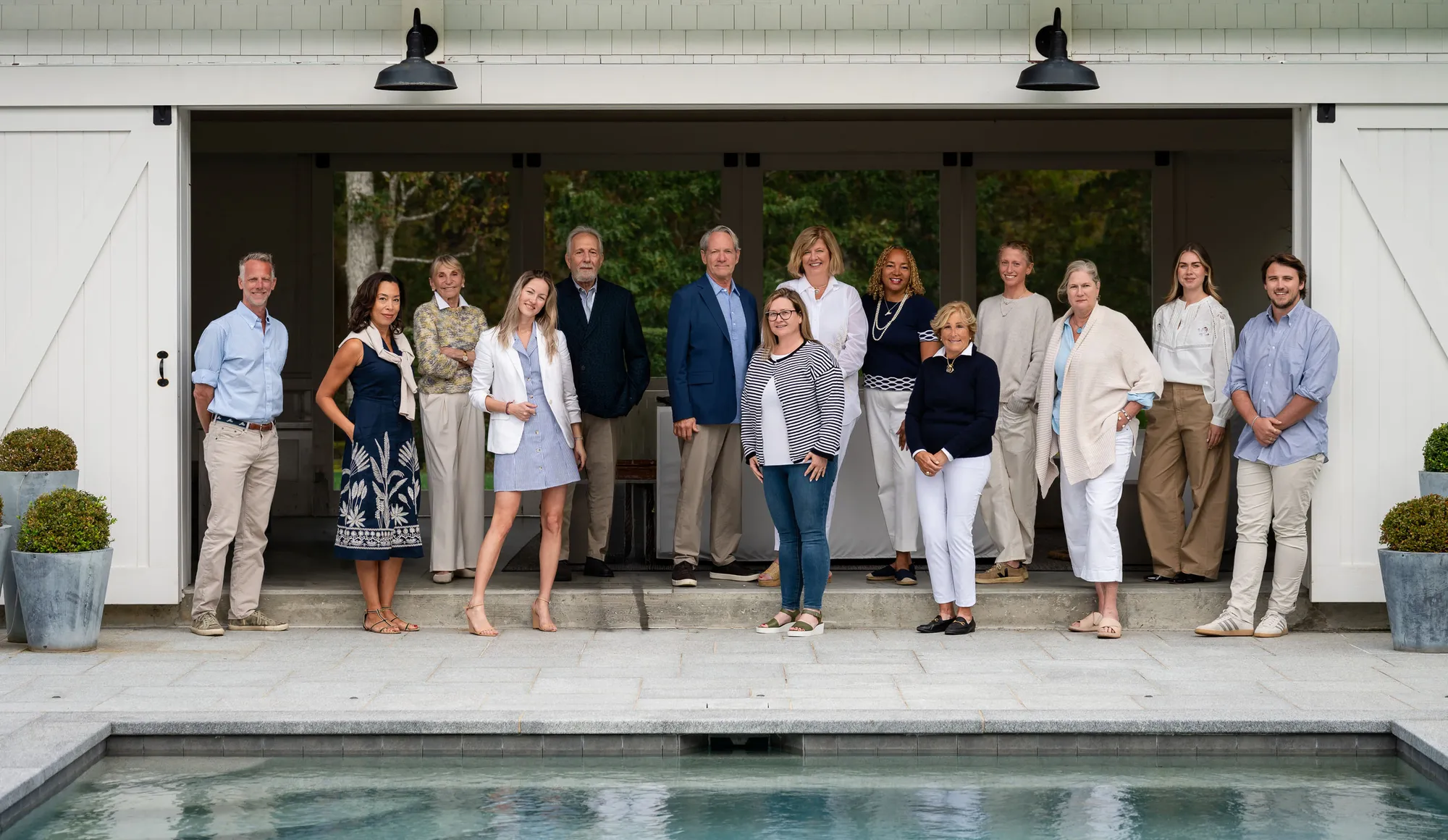 Photo of a large team of 14 people