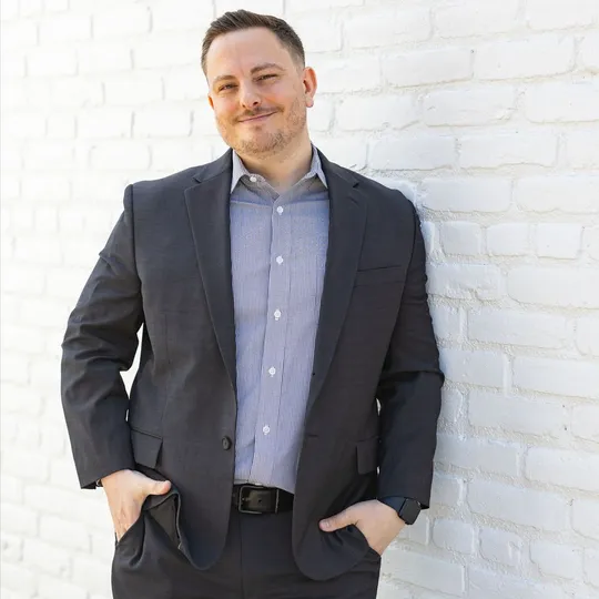 Alfie Tolli, Agent in  - Compass