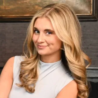 Bela Emerson, Agent in  - Compass