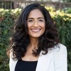 Nina Sidhu, Agent in  - Compass