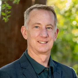 Chris Clark, Agent in  - Compass