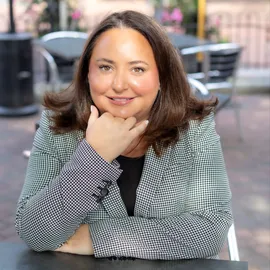 Maghda Amrani, Agent in  - Compass