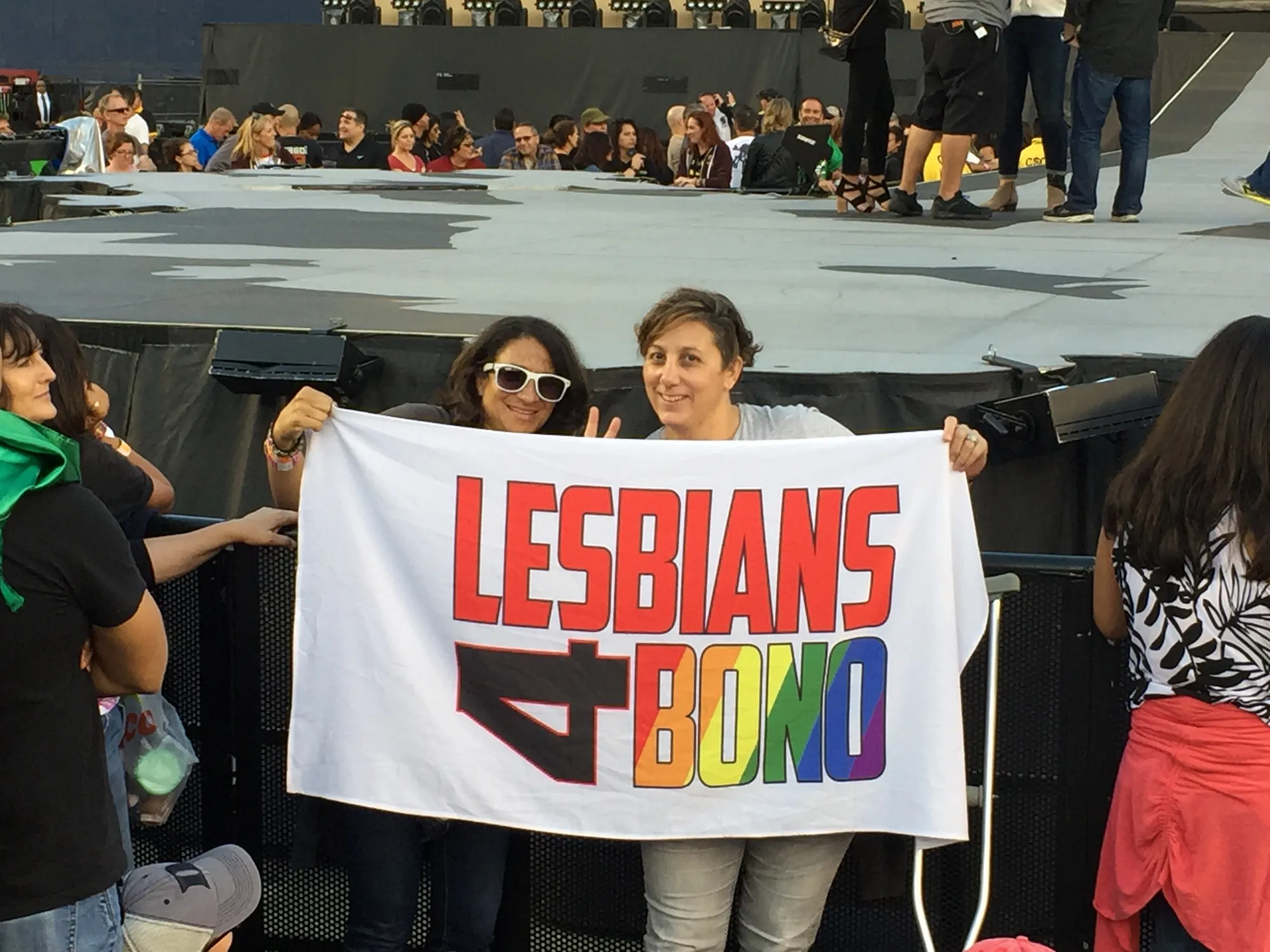 Bono asks to hold my banner while singing