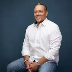 Chris Tuite, Agent in  - Compass