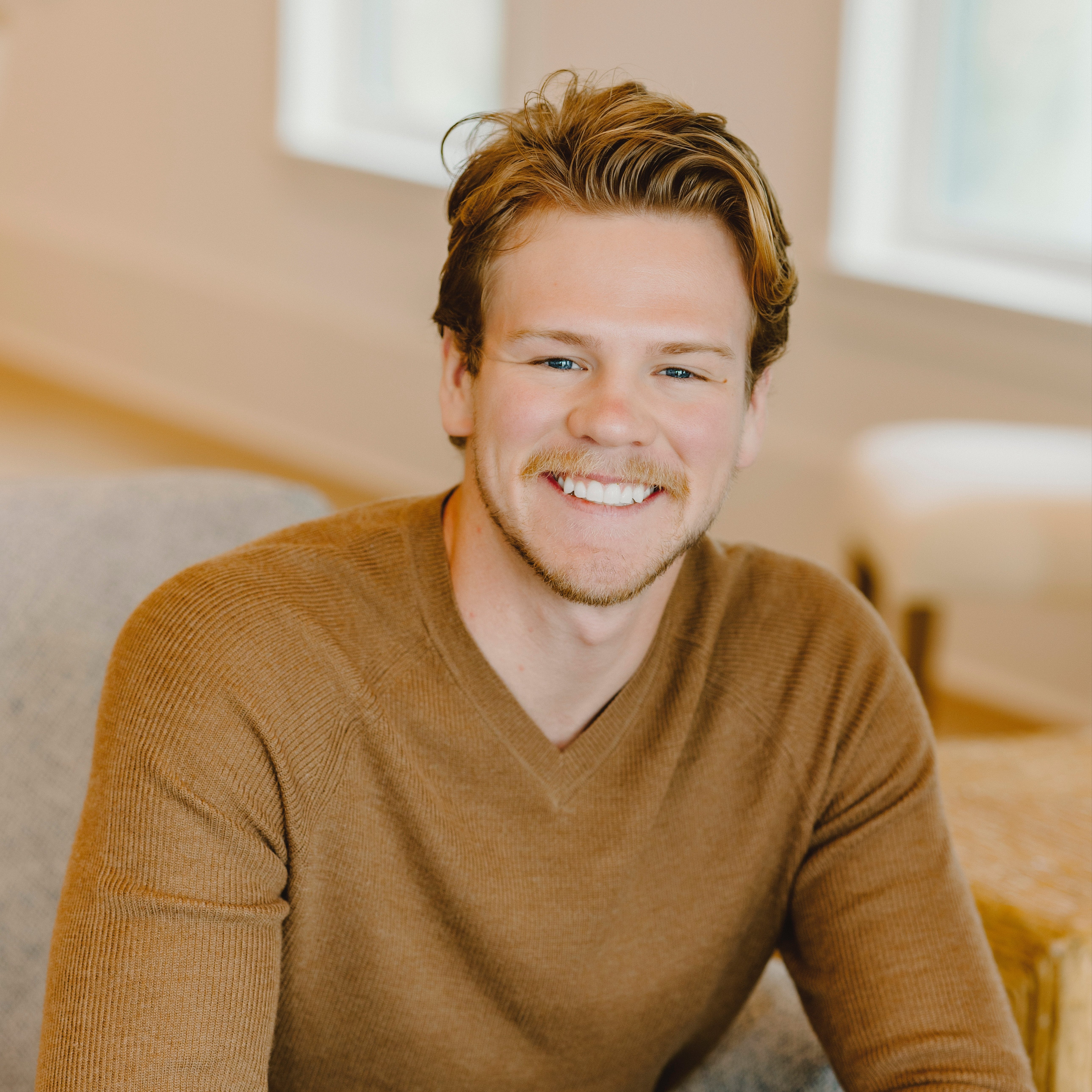 Headshot of Ely Caroom