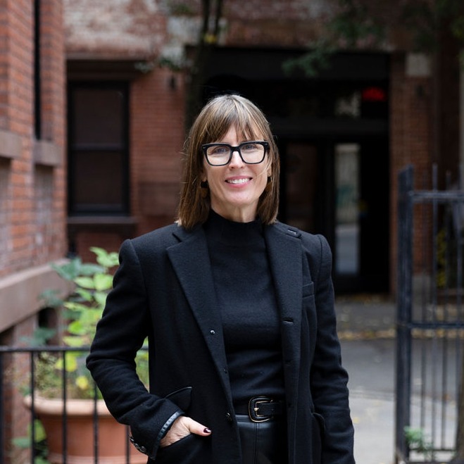 Headshot of Suzanne Adler