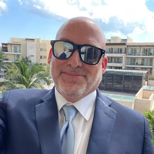 John Shanahan, Agent in  - Compass